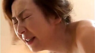 Japanese milf sucking together with riding flounder